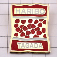 ピンバッジ・ハリボ赤い袋キャンディーお菓子 HARIBO GERMANY TAGADA