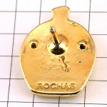 ピンバッジ・金色ロシャ香水壜型 ROCHAS GLOBE