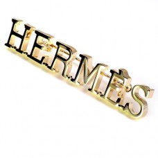 ブローチ・エルメス金色ロゴ文字 HERMES