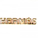 ブローチ・エルメス金色ロゴ文字 HERMES