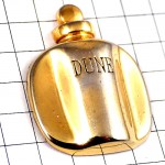 ピンバッジ・クリスチャンディオール香水デューン壜ゴールド金色 CHRISTIAN-DIOR DUNE