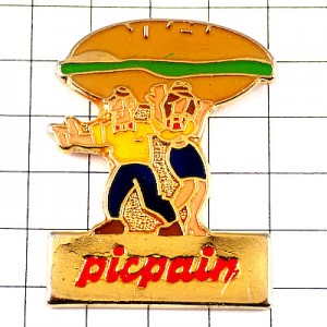 ピンバッジ・巨大ハンバーガーと店員たち