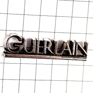 ピンバッジ・香水や化粧品ゲラン銀色シルバー文字 GUERLAIN