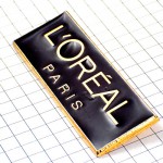 ピンバッジ・ロレアル化粧品パリ黒いロゴ文字 L-OREAL PARIS