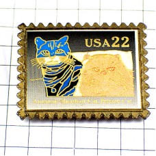 ピンバッジ・青い猫ネコ/USAアメリカの切手型