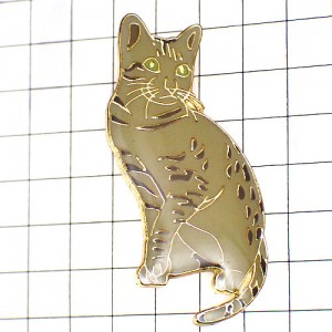 ブローチ・緑の目で見上げる猫 OCICAT