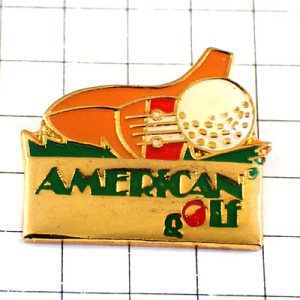 ピンバッジ・ゴルフ球に当たるクラブ緑の芝 AMERICAN-GOLF