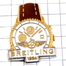 ピンバッジ・ブライトリング腕時計茶色いベルト金色 BREITLING SWISS