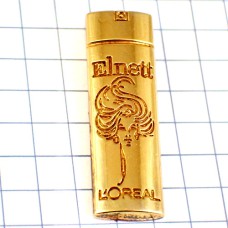 ピンバッジ・ロレアル化粧品ヘアケア女の子ゴールド金色 L-OREAL ELNETT