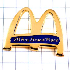 ピンバッジ・マクドナルドＭ20周年ゴールド金色