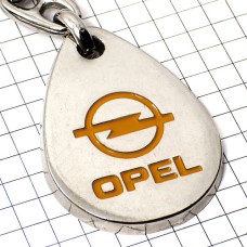 キーホルダー・オペル車ロゴ銀色シルバーOPEL黄色文字 OPEL GERMANY