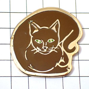 ピンバッジ・茶色いネコ緑の目の猫