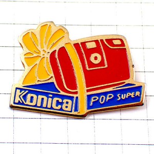 ピンバッジ・コニカ赤いカメラ写真機リボンの贈り物 KONICA KONICA-POP