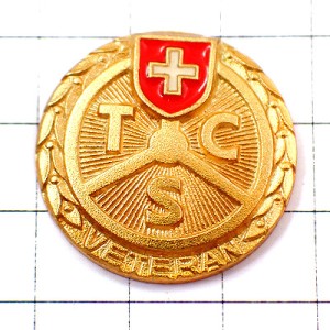 ピンバッジ・スイス国旗の紋章ツーリングクラブ自動車ハンドル金色ゴールド TOURING-CLUB-SUISSE TCS