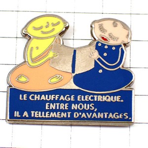 ピンバッジ・一つの本を読む女の子とお坊さん CHAUFFAGE-ELECTRIQUE FRANCE