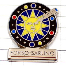 ピンバッジ・顔のある太陽とペン万年筆 FORBO-SARLINO