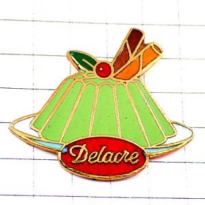 ピンバッジ・緑色のプリンお菓子シガレットルッセ DELACRE CIGARETTES-RUSSES FRANCE