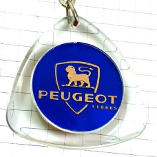 キーホルダー・プジョー車ライオンの紋章ゴールド金色ロゴ紺色エンブレム暗号 PEUGEOT FRANCE