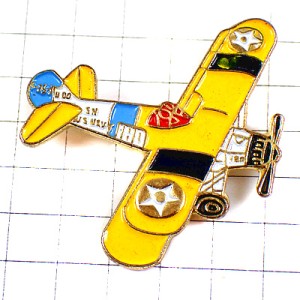 ピンバッジ・黄色い戦闘機ミリタリー複葉機プロペラ飛行機 USNAVY WW1