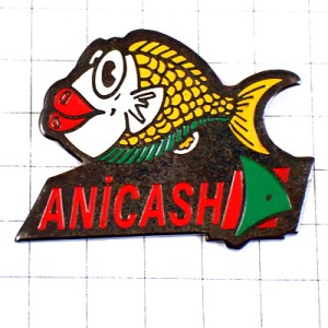 ピンバッジ・黄色い魚アニキャッシュ真っ赤な唇