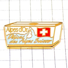 ピンバッジ・チョコレートの箱スイス国旗アルプス山脈