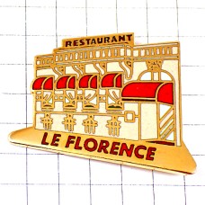ピンバッジ・レストラン外観ルフロランス赤い日除け
