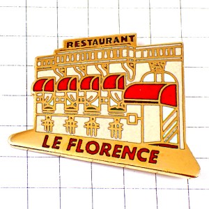 ピンバッジ・レストラン外観ルフロランス赤い日除け