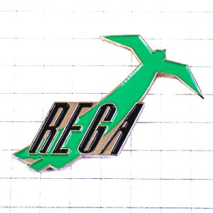ピンバッジ・羽ばたいて舞い上がる鳥グリーン緑色の十字