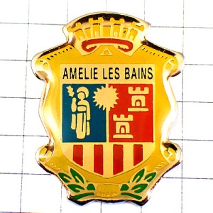 ピンバッジ・城塞と聖人と太陽の紋章アメリー＝レ＝バン＝パラルダ AMELIE-LES-BAINS FRANCE