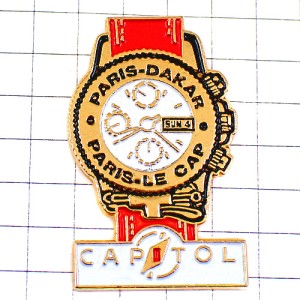 ピンバッジ・パリダカール腕時計パリルカップ車ラリー赤カピトル CAPITOL  PARIS-DAKAR PARIS-LE-CAP