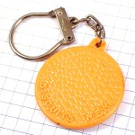 キーホルダー・丸いビスケット型TWISTサクソフォン音楽サックス楽器ツイスト