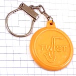 キーホルダー・丸いビスケット型TWISTサクソフォン音楽サックス楽器ツイスト