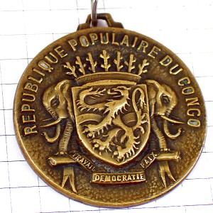 キーホルダー・ゾウ象ライオン紋章スプリングボック動物エールアフリク航空会社ブロンズ色 AIR-AFRIQUE CONGO