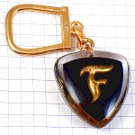 キーホルダー・ファイアストン社ゴールド金色タイヤ車ブルボン社製 FIRESTONE