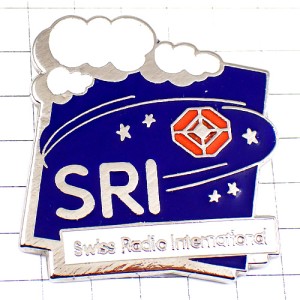 ピンバッジ・スイス国際ラジオＳＲＩ白い雲スター星