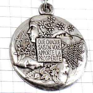 キーホルダー・四季キャトルセゾン女の子の横顔シルバー銀色 FOUR-SEASONS  CHAQUE-SAISON-PROSPERITE PICHARD FRANCE
