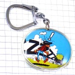 キーホルダー・チェック柄のシャツにジーンズ車トラック漫画バンドデシネBD