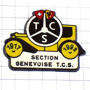 ピンバッジ・スイス国旗の紋章ツーリングクラブ自動車ハンドル黄色い車 TOURING-CLUB-SUISSE TCS SWISS
