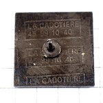 ピンバッジ・水色の矢印の四角ブルー A-HONZEL RIVETS MECANIC