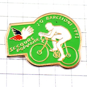 ピンバッジ・自転車バルセロナ五輪オリンピック助け合いの手 BARCELONA-1992 SPAIN SECOURS-POPULAIRE