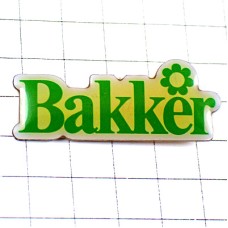 ピンバッジ・緑色の文字と花グリーン BAKKER GARDEN ピンバッジ・緑色の文字と花グリーン BAKKER GARDEN