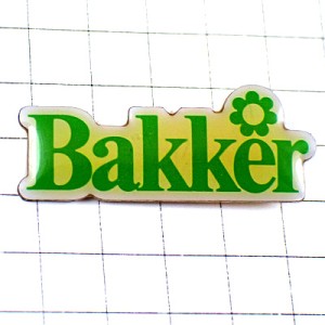 ピンバッジ・緑色の文字と花グリーン