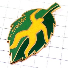 ピンバッジ・葉っぱに黄色い人ニクラウストロックスラー画スイスのグラフィックデザイナー NIKLAUS-TROXLER SWISS LEAVE