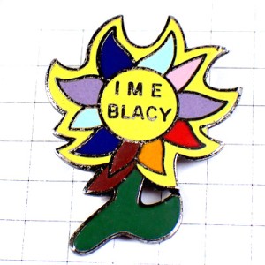 ピンバッジ・カラフルな花びらの花一輪