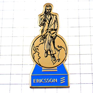 ピンバッジ・地球に腰掛けるスーツの男エリクソン社