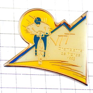 ピンバッジ・自転車レース太陽 VTT BRIANCON FRANCE