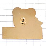 ピンバッジ・青い目の熊のぬいぐるみ黄色い水仙の花クマ