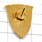 ピンバッジ・太陽と白い帆船アルファベットＳＮ紋章10年