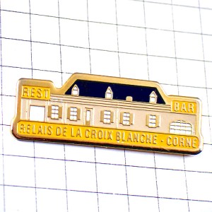 ピンバッジ・白い十字のホテルやレストラン