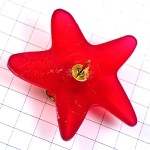 ピンバッジ・赤い星スター海星ヒトデ金色ゴールドの渦巻き STARFISH SAINT-AMOUR FRANCE